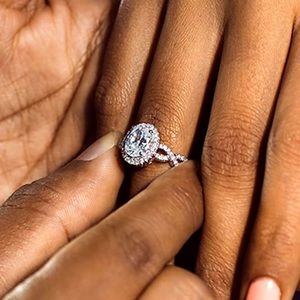 Sold - Halo Bridal Ring in Sterling Silver with Oval and Cubic Zirconia